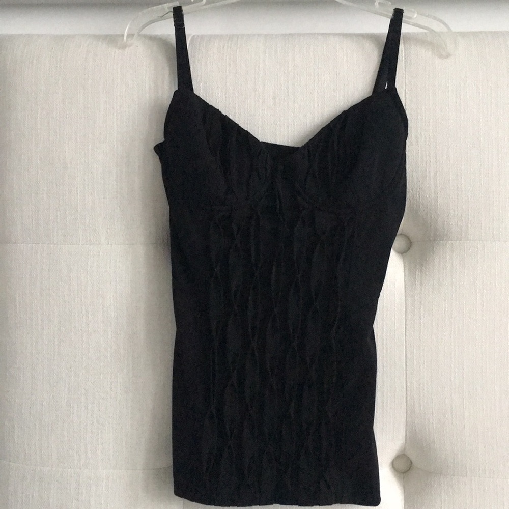 Leifsdottir sleeveless shirt.
